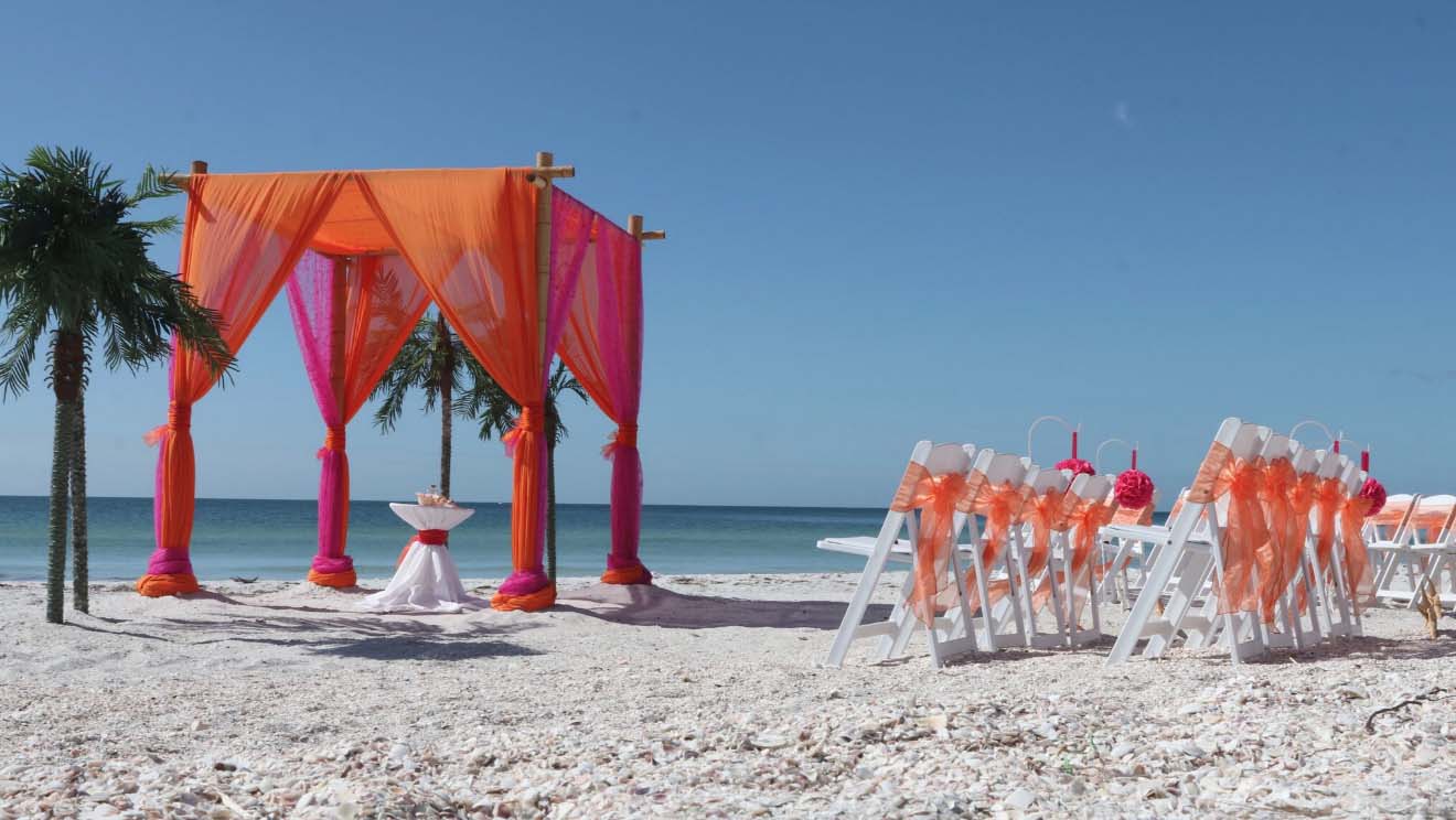 orange and fuchsia beach wedding theme