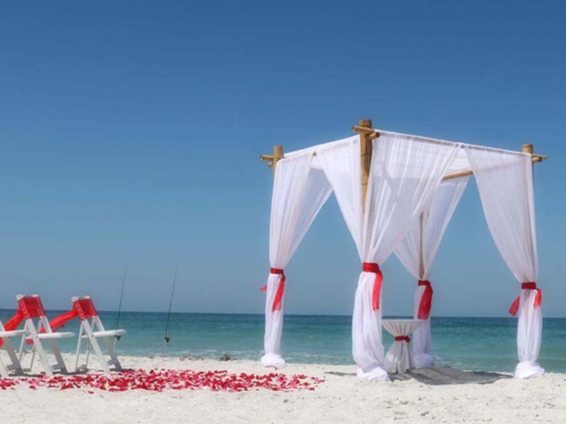 Red beach wedding theme